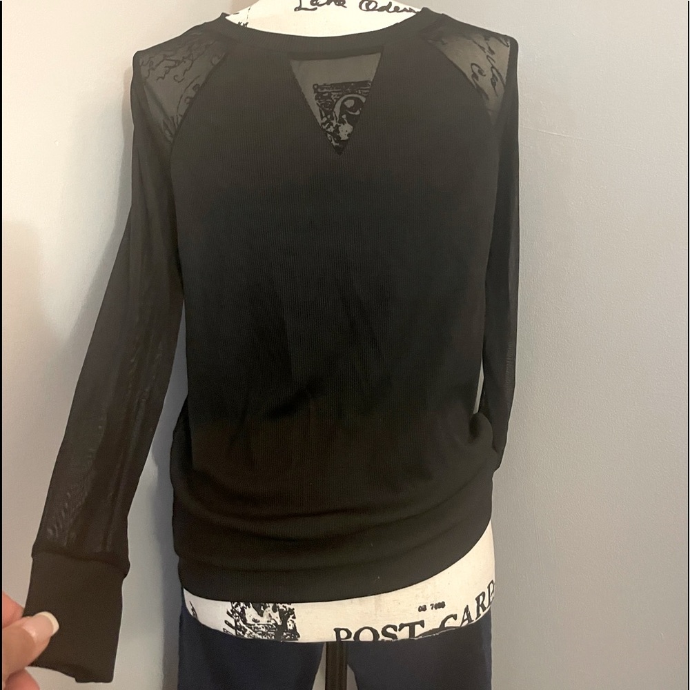 Black top with see through sleeves and neck!
